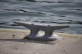 A metal boat tie attached to the pier.    North Vancouver BC CanadaÃ£â¬â¬ Royalty Free Stock Photo